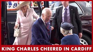 King Charles and Queen Camilla greeted by CHEERING crowds in Cardiff | HELLO!