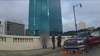 Toledo police officers rescue woman on side of MLK Bridge