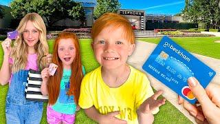 i GAVE my 8 YEAR OLD a DEBiT CARD! (& here’s why)