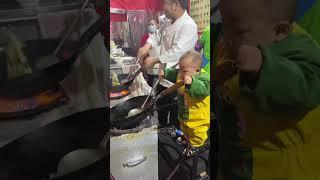 15 month old boy skilfully fries rice, mimicking dad's actions || Viral Video UK