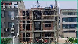 Hard-working workers built a large 3-story house
