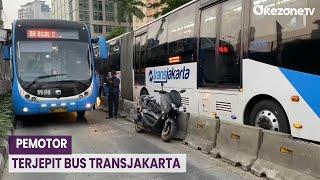 Terobos Busway, Pemotor Terjepit Bus Transjakarta