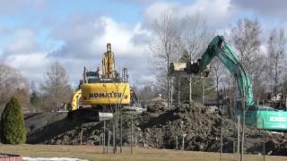 Excavator work on the road construction 1.