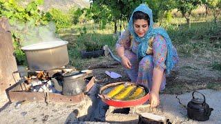 Cooking stuffed salmon in Iranian village style