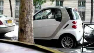 Smart Car getting out of a tight parking space