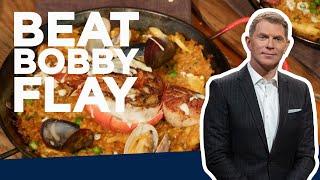 Bobby Flay Makes Seafood Paella | Beat Bobby Flay | Food Network