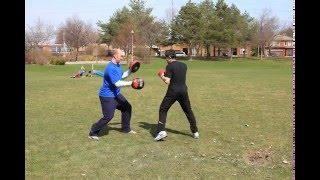 Boxing workouts training outdoors in park-animated gif video