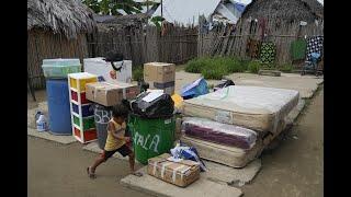 Panama community forced from Caribbean island by rising sea levels move into new homes