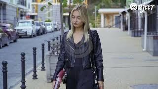 Beautiful Girl Walking Down in the City Wearing Black Leather Jacket | By Oujeer