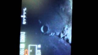 Moon moving across telescope viewfinder - Real Time