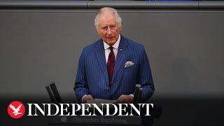 King Charles switches between fluent German and English as he delivers historic address