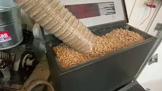 Pellet stove conveyor