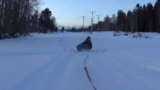 Failed on sledge on snow scooter with my friend