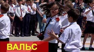 Russia. Young Cossacks dance a waltz