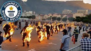 Most people performing full body burns - Guinness World Records