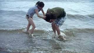 Cindy and Spencer (mom and Son) Wrestling in Lake Michigan, Ludington.