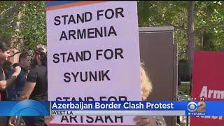 Demonstrators rally outside Azerbaijan consulate amid violence between Armenia