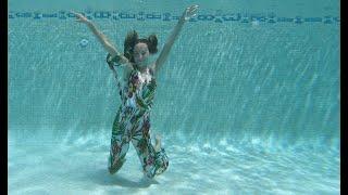 Carla Underwater swimming with clothes on