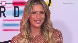 Renee Bargh glitters in gold on the 2018 AMAs red carpet