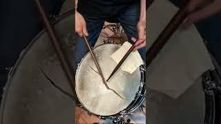 Moment of breaking calf skin drum head