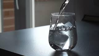 Pouring Water In A Glass
