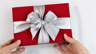 How to tie a ribbon on a gift box