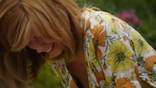 Kate Garraway bending outside