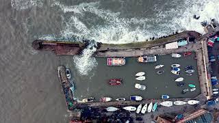 Storm Babet - breaching of North Berwick Harbour Wall