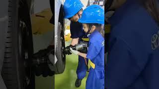 Chinese Toyota automobile company teaching their children how to repair car engine practically.