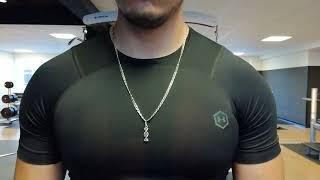 small pec bounce in tight shirt