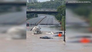 'Now or never': Trucker drives through flooded road | TORONTO STORM