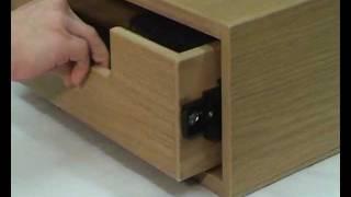 How does a soft-close drawer slide work?