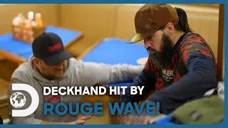 Rogue Wave Nearly Sends Deckhand Overboard, Leaving Him Injured! | Deadliest Catch