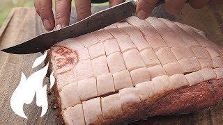 juicy Duroc pork in beer pool on ceramic grill 