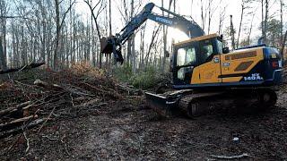 Clearing a Slippery Slope with the Hyundai 140 and John Deere Dozer