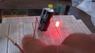 How to Use a Capacitor to Act as a Temporary Power Source for a Load