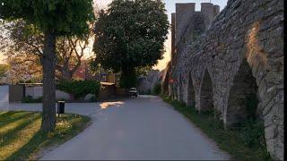 Sweden Walks: by the Medieval city Wall of Visby, Gotland, at sunset