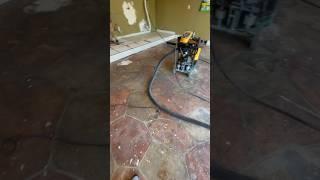 Dream Garage Epoxy Floor project and stamped concrete removal