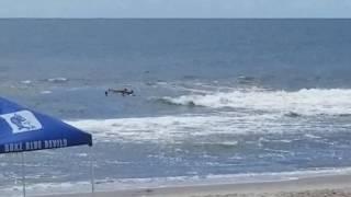 Rescuing a father and son from a rip current at the  Fort Fisher State Recreation Area.