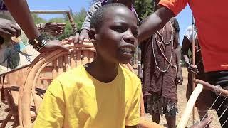 Raw Talent Form One Student from Baringo - Playing a Traditional Instrument