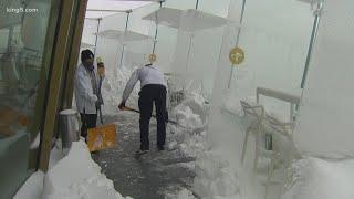 See how crews remove snow from atop the Seattle Space Needle