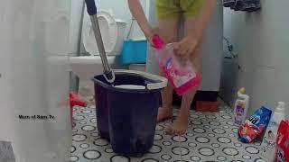 Morning routines - beautiful single mom cleaning the house