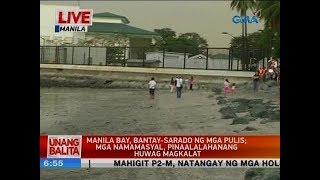 UB: Manila Bay, bantay-sarado ng mga pulis; mga namamasyal, pinaalalahanang huwag magkalat