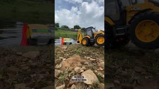 JCB Backhoe loader Pulling stuck Heavy duty Tata Truck in water #rajminitoy #tractor #truck #jcb