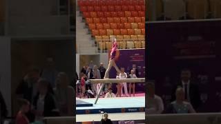 Elegance and Precision: Her Stunning Balance Beam Routine!