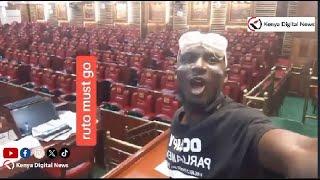 Angry Protester sits On Wetangula's Seat in Parliament as he says! 'RUTO MUST GO!!'