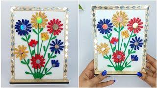 cotton buds wall hanging craft idea // Photo frame made by ice cream sticks and cotton buds.