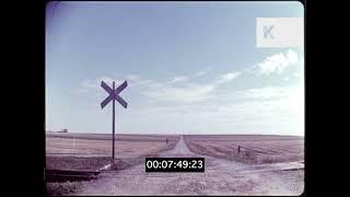 1960s US Midwest Crop Fields POV Driving Railroad Crossing