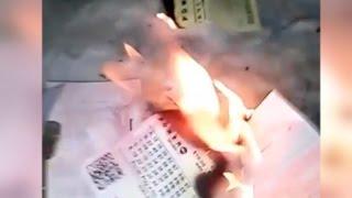 Watch These People Cry and Burn Their Tickets After Not Winning Powerball