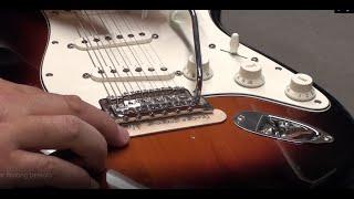Floating a Tremolo on a Fender Stratocaster - it's not that hard to do!  You need a magic stick...